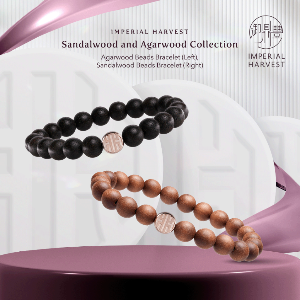 "Imperial Harvest Sandalwood and Agarwood Collection showcasing the Agarwood Beads Bracelet (left) and Sandalwood Beads Bracelet (right). Each piece is accented with a signature rose gold emblem, symbolising harmony, prosperity, and elegance.