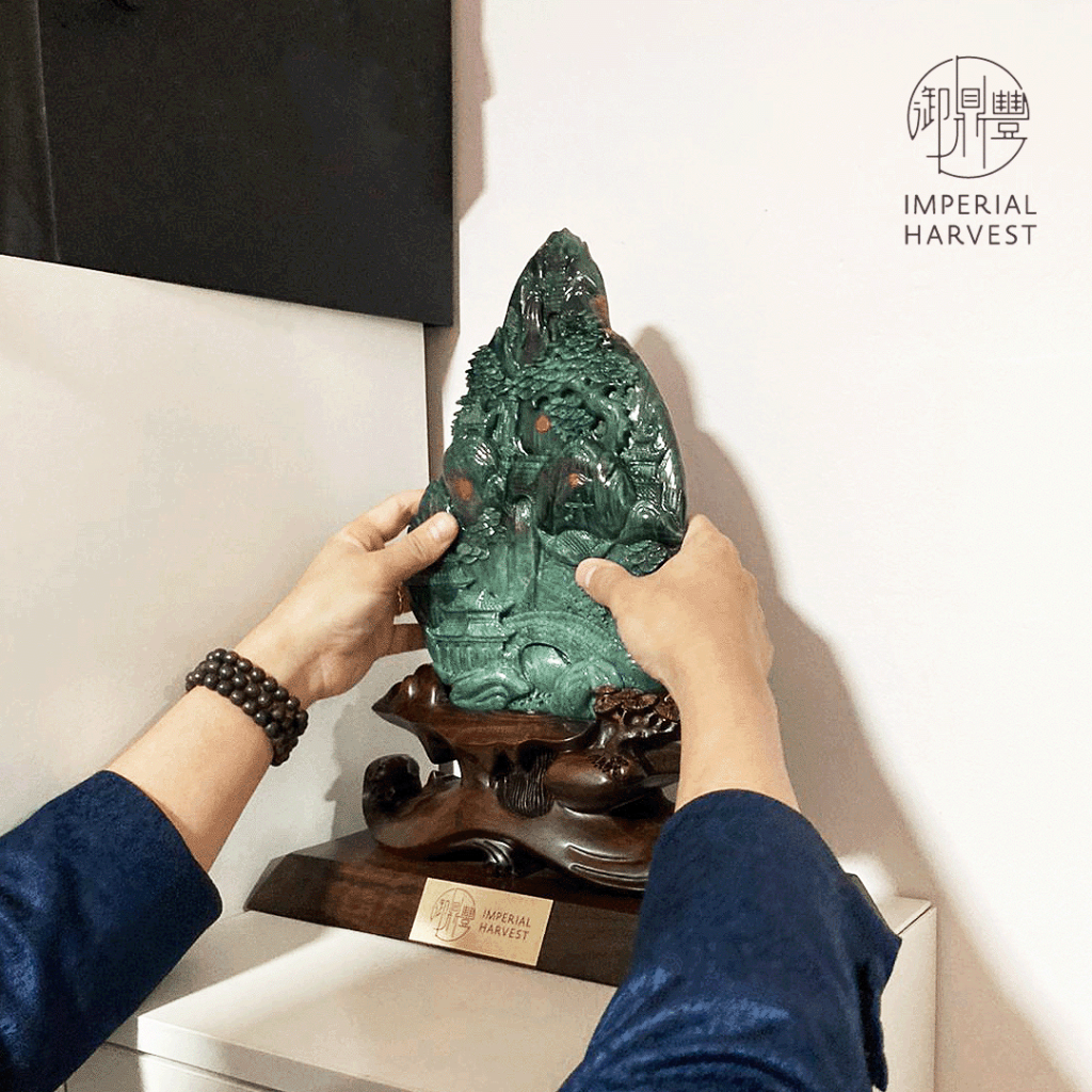 Master David installing the Imperial Harvest Qian Long Jadeite Mountain at a client's home. 