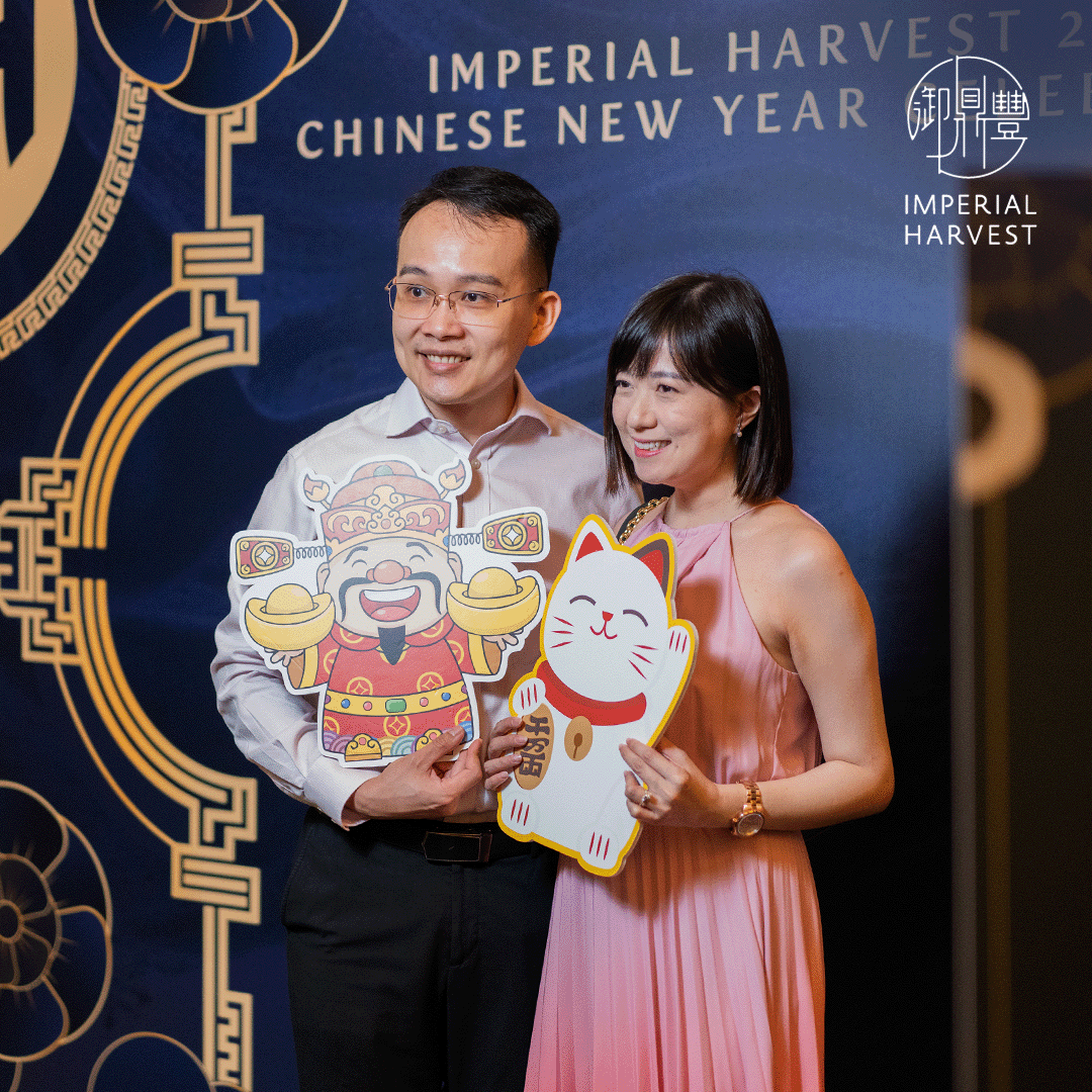 Blog_02.21_Imperial Harvest 2025 CNY Celebration_Guest at Photobooth Guests in front of photobooth wall