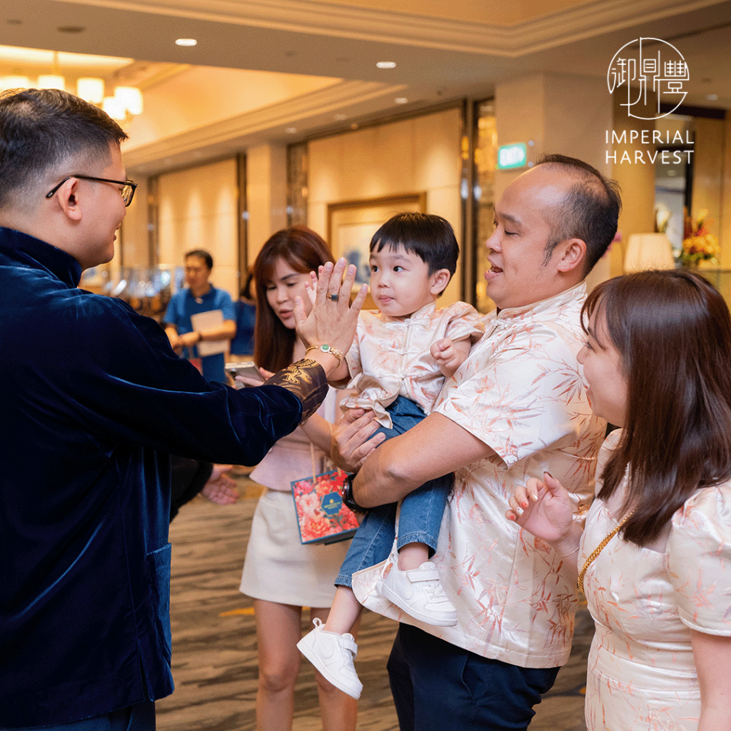 Master David greeting guests at the Imperial Harvest 2025 Chinese New Year Celebration